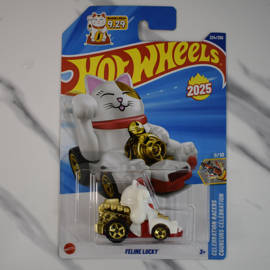 Hot Wheels Feline Lucky cat toy figure in packaging on a gray background